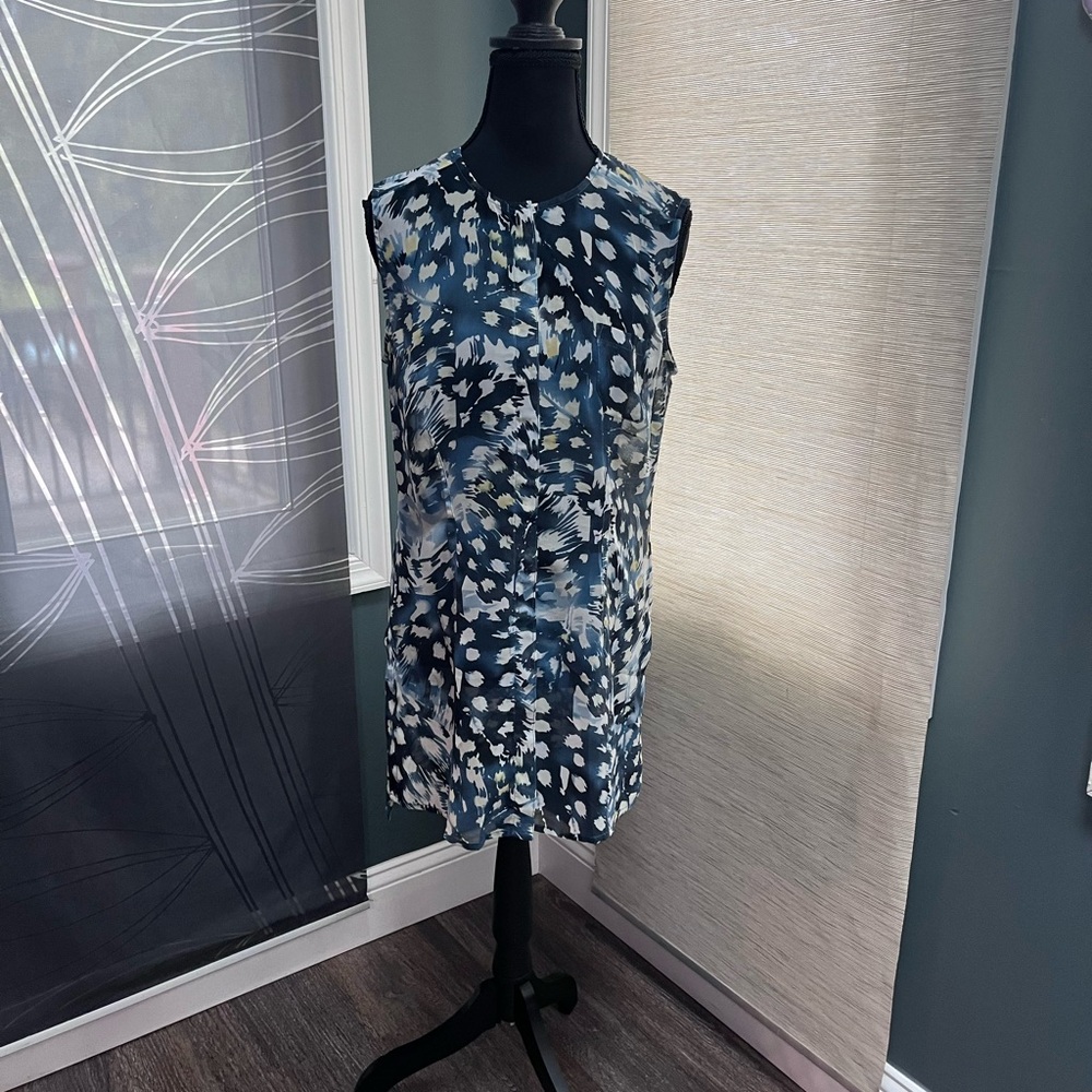 EUC CAbi Blue and White Patterned Buttondown Blouse with Slits on Side.